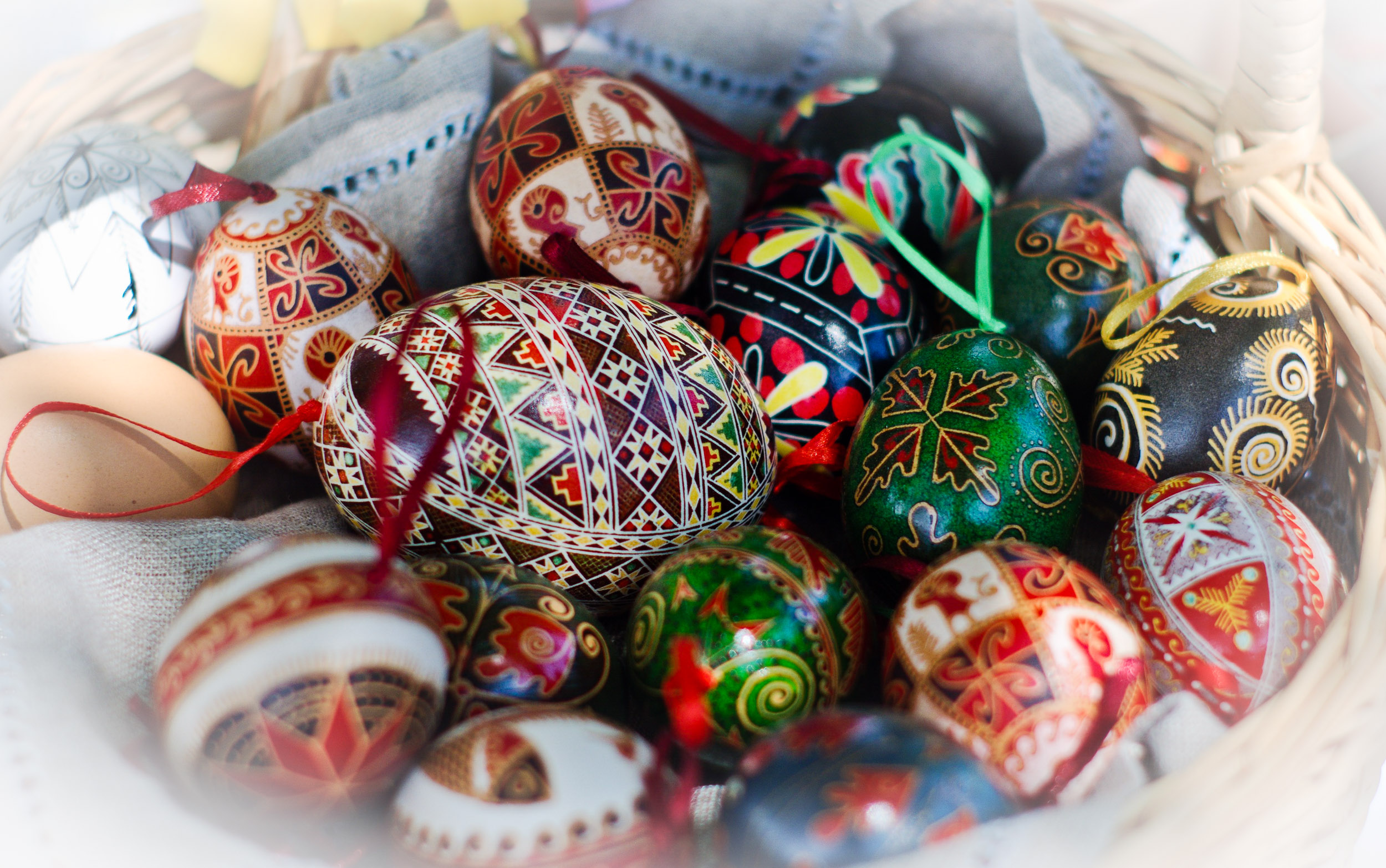 Lviv, Ukraine. 06th Apr, 2023. A young woman makes Easter eggs. A young  woman in traditional Ukrainian clothing makes Easter eggs using ancient  technology. Pysanka is an ancient tradition, one of the