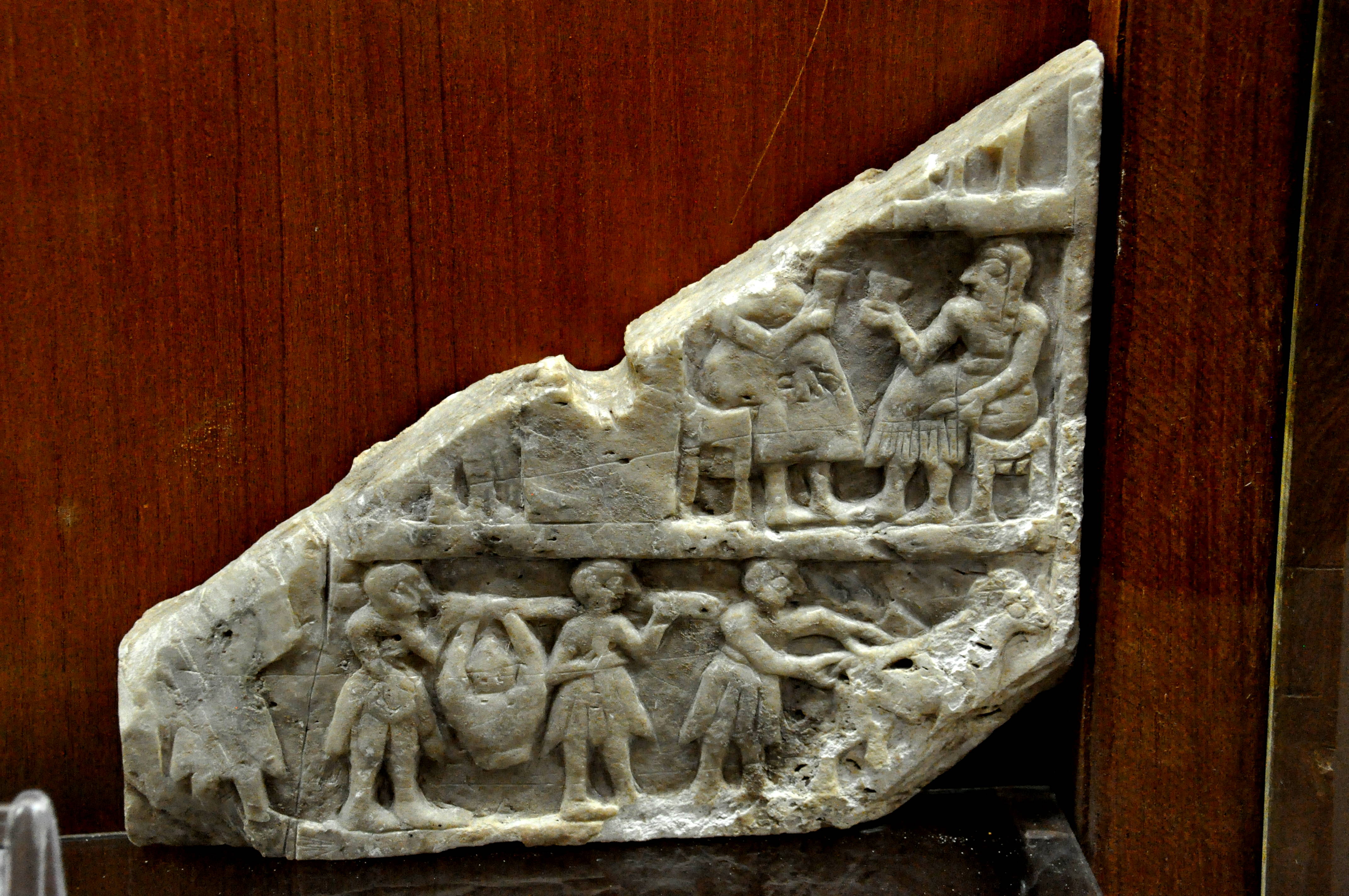 A Sumerian Wall Plaque Showing Libation Scenes (Illustration