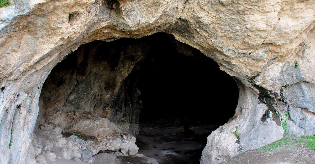 The dark cave of Hazar Merd Group of Caves (Illustration) - World ...