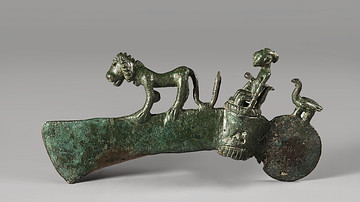 Bronze Axe Head Topped with a Man Ruling Animals from Western Iran