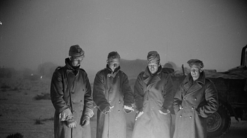 Soldiers Keeping Warm in the Desert Night