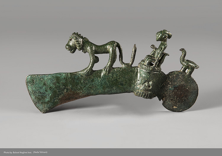 Bronze Axe Head Topped with a Man Ruling Animals from Western Iran