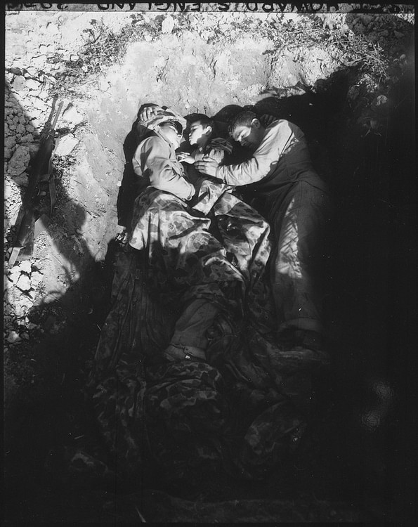 Marines Share a Foxhole with an Okinawan Child, 1945