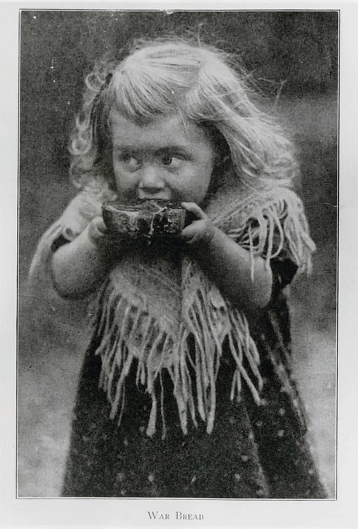 Young Girl Eating War Bread